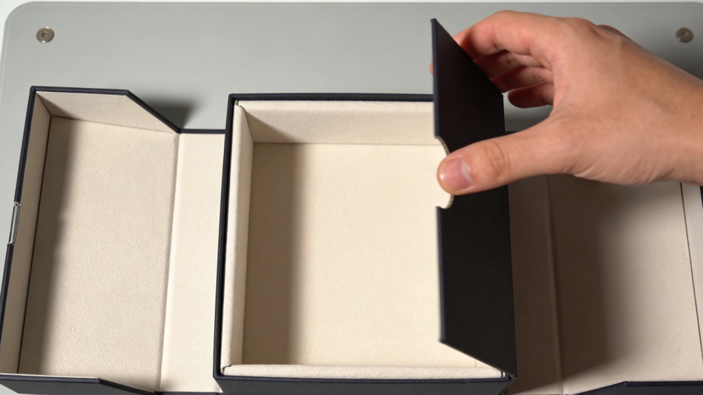 Luxury collapsible rigid box with magnetic closure being assembled